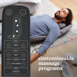 A man enjoying a massage with  Homedics Total Recline Shiatsu Massage Cushion with a view of the remote and different massage modes.