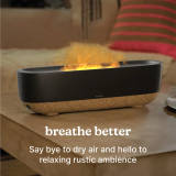 Fireside Ultrasonic Humidifier sits on the coffee table as a center piece while releasing mist into the air