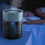 Blue | Homedics TotalComfort UV-C Ultrasonic Humidifier on nightstand humidifying air while customer sleeps soundly