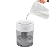 Grey | Water being poured into the top of the Homedics TotalComfort UV-C Ultrasonic Humidifier