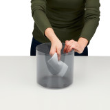Grey | Customer cleans water tank of the Homedics TotalComfort UV-C Ultrasonic Humidifier